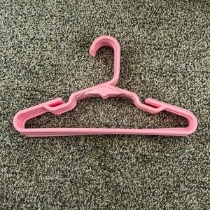 Girl’s pink hangers. 86 hangers 8 bundles of 10, 1 bundle of 6.